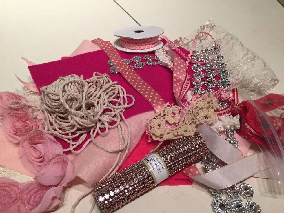 So I looked at what I had. Which yes I had all of this. I'm still trying to use up all those embellishments I found myself buying for scrapbooking years ago. I don't need this to create nice layouts.