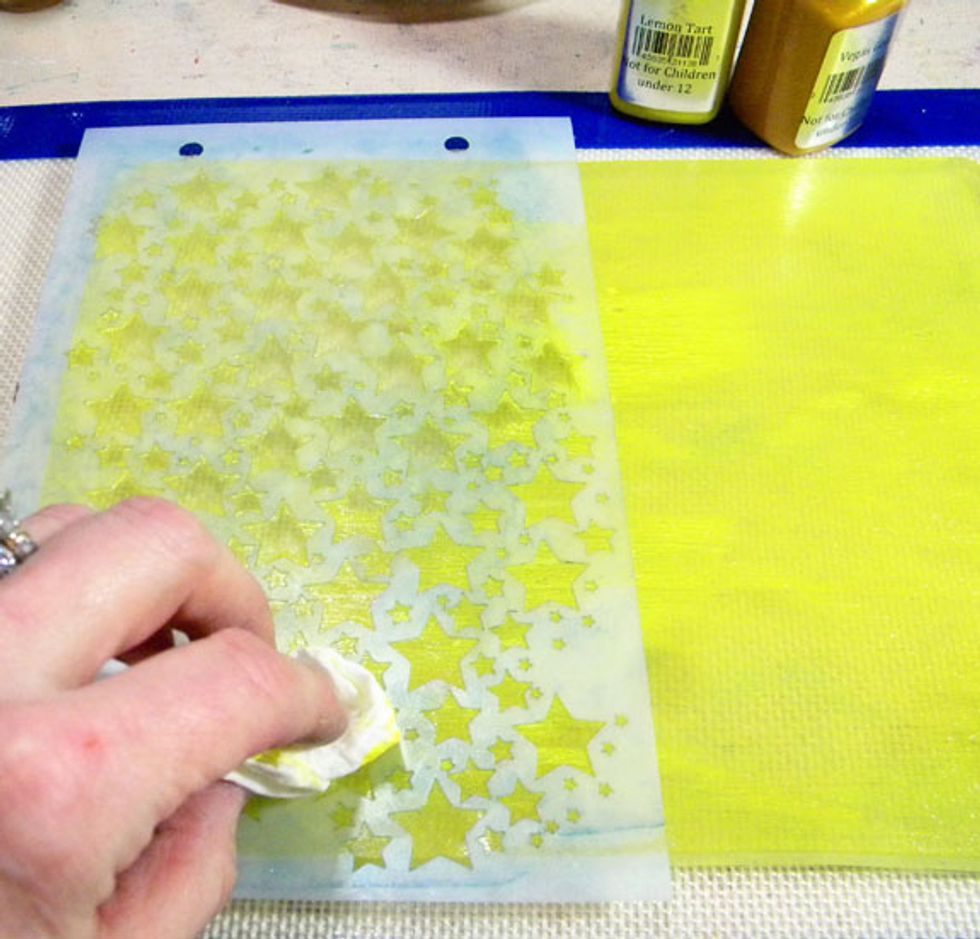 So I played with this technique some more. This time I placed the twilight stencil down over Lemon Tart Velvet and Vegas Gold Sorbet and removed the paint from the stars using a baby wipe.