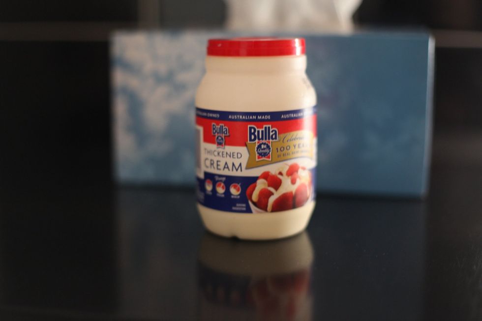 So if you can't find Danish cream just use 300 ml of thickened cream. Add it to your melting chocolate. Without turning up the heat, just stir the cream and chocolate until smooth.