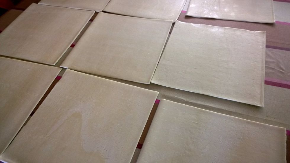 So if you want to make your own pastry go ahead, I'm going the lazy option thanks. Puff pastry on the table to thaw. Softer dough, easier to roll later.