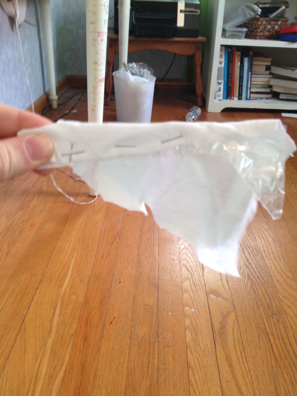 So it should look like this. Keep stapling the back layer of fabric to the tape, and be sure no staples show on the front! (Some may end up there though)