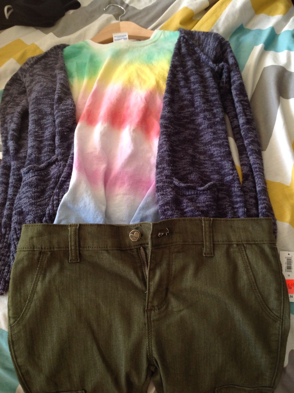 So let's just say you have only one shirt and the rest are in the dryer then you suddenly see this cute gray jacket hidden in the back of your closet and your like yay it matches with the green pants.