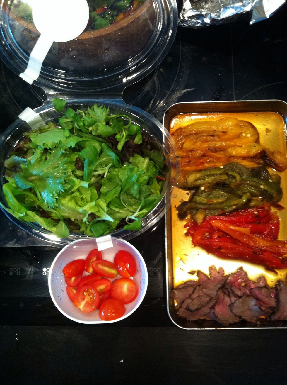 So now we have Salad leafs, Cherry tomato Our grills capsicum And thinly slice left over steak