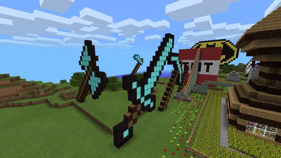 So now, you should have a diamond sword, a diamond hoe, and now a diamond axe. You can see the pickaxe in the background. A guide will be coming out soon. I have started the shovel at the back
