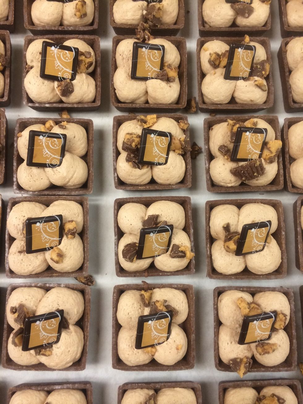 So pretty, but not finished. After all the tarts are filled and garnished, they are packed up and delivered to another part of campus to be completed for this night's event.