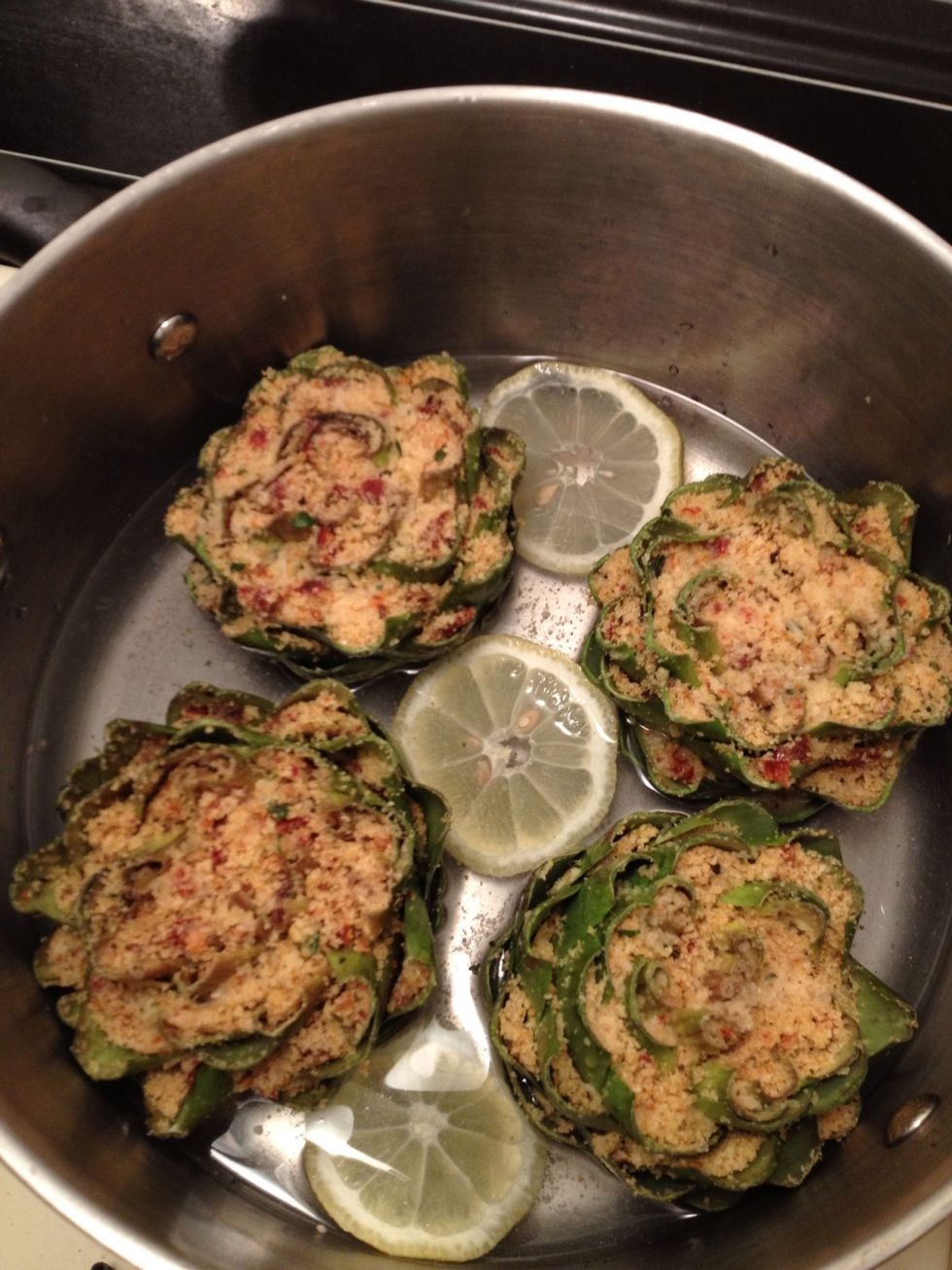 So pretty... You can squeeze more lemon if you want for more flavor. Cover with a lid and turn on heat to med-low. I steam them for about 30 minutes.