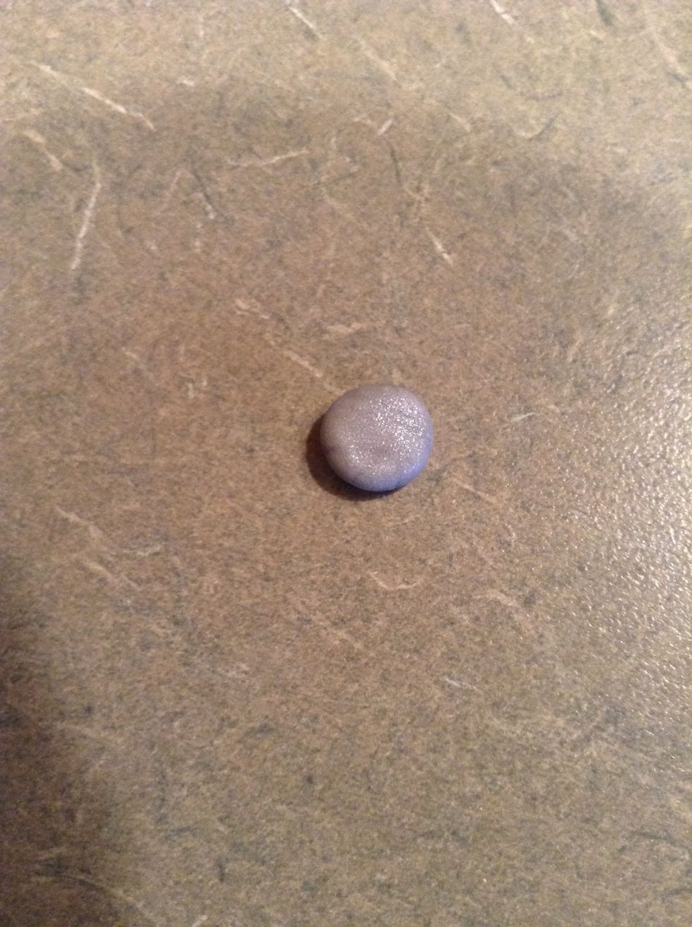 So start with a ball of grey and flatten it out to the size of your home button.