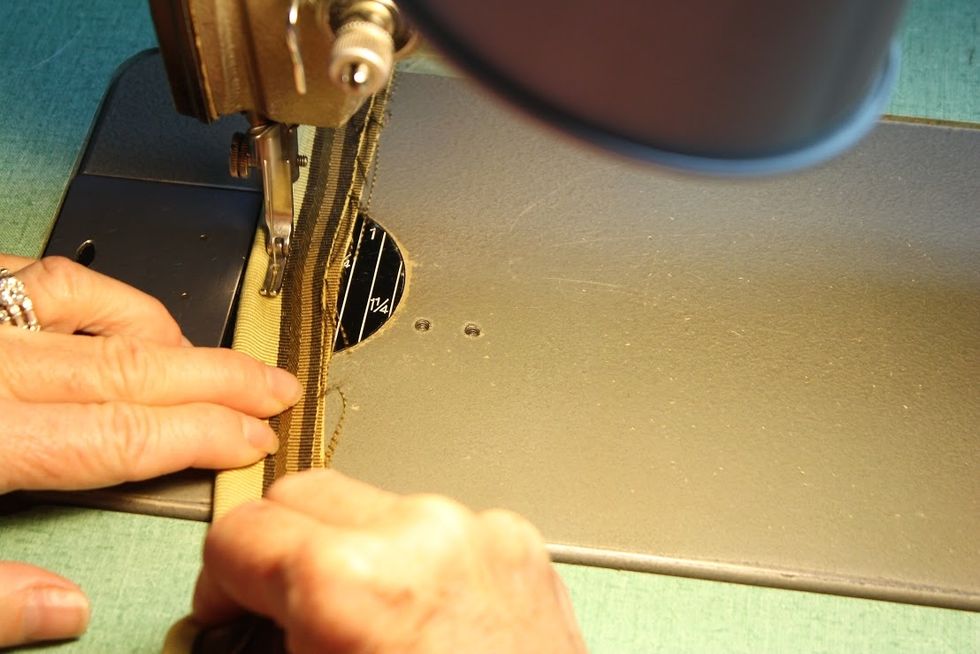 so that when you sew it to the cushion with a regular zipper foot, you can get really close and the previous stitching is always concealed.