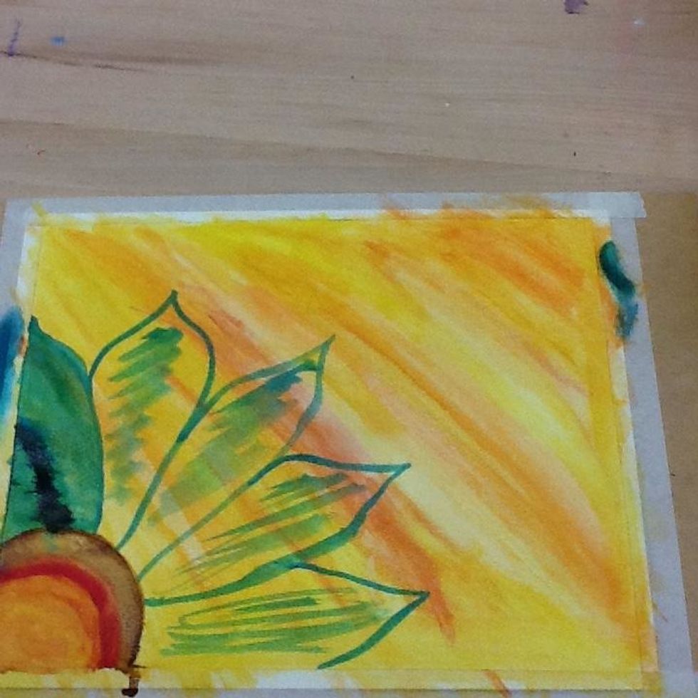 So then do the center with blended brown, red, orange, and yellow. Then do your flower with blended blues, purples, and greens.