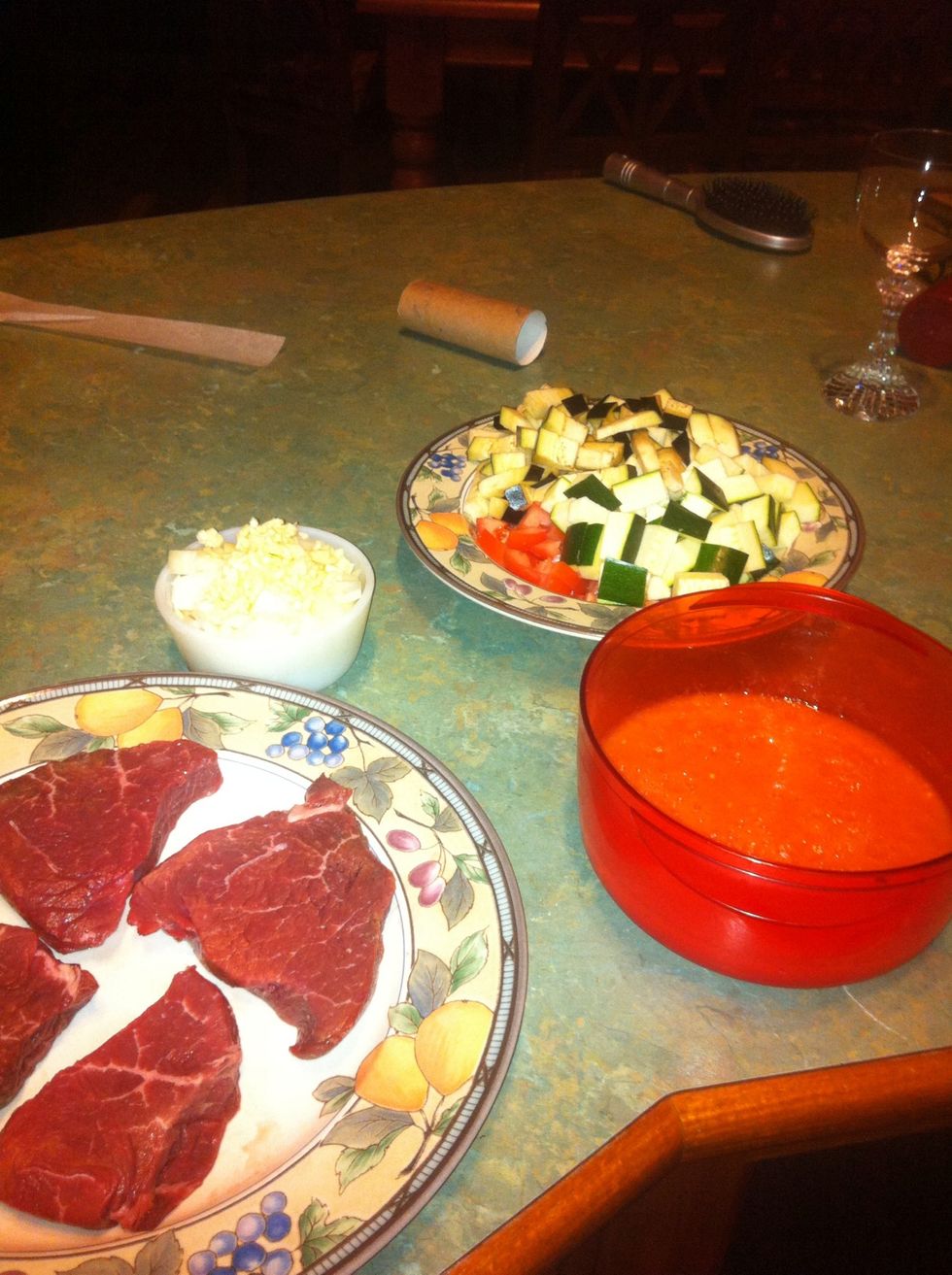So this is all the ingredients... The beef, onion and garlic, veggies and tomato pur\u00e9e