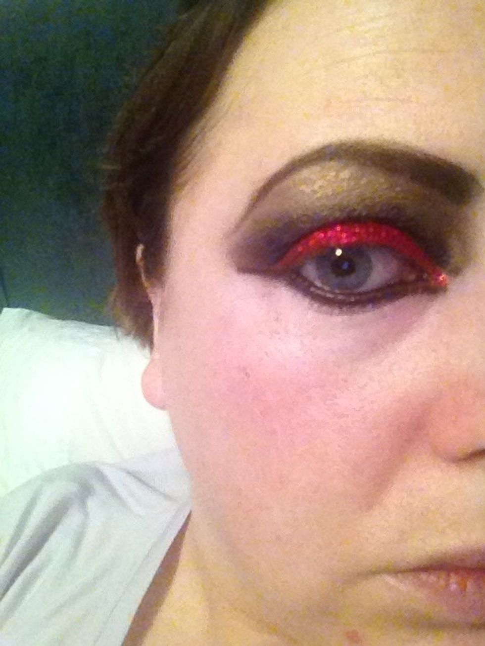So with glitter fixing gel I've added red glitter over the area I added red shadow