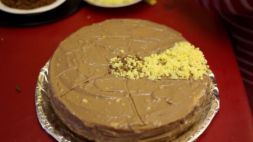 So without really going into the decoration part of the cake too much. It's really up to you how you colour the outside of your cake. Ours is simple vanilla and choc alternates.