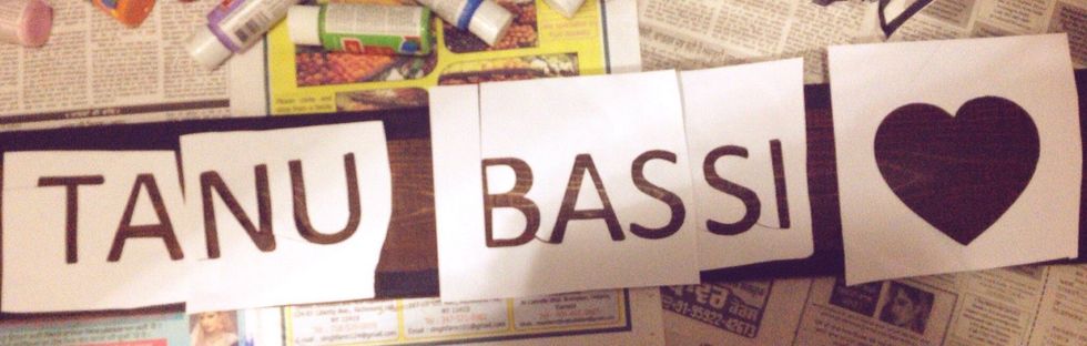 So you can cut those out and be sure to save the middle pieces like the triangle in an A. So once your border is dry you can take off the tape. Next arrange the words. Now you can tape the words.