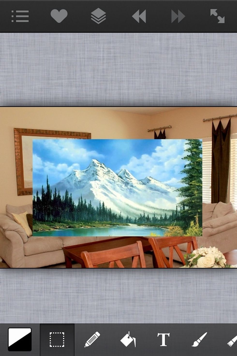 So you'll end up with this. The mountain painting is on a layer above the background layer (see my layers guide to understand layers).