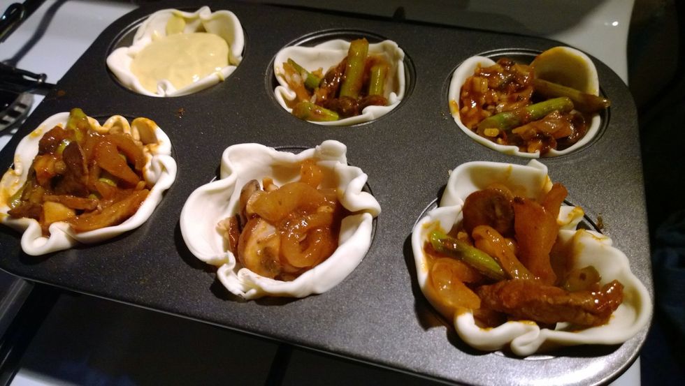 So you're wondering why you're seeing my beef and vegetable lunch in my pastry. Well I ran out of custard and I had 4 extra pastry cups. This just shows that you can put anything in your pastry.