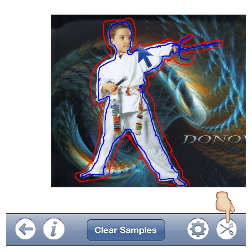 So you should now have something that looks like this with the item (foreground) outlined in blue and the background outlined in red. Then tap the scissors to move on to editing your cut result.
