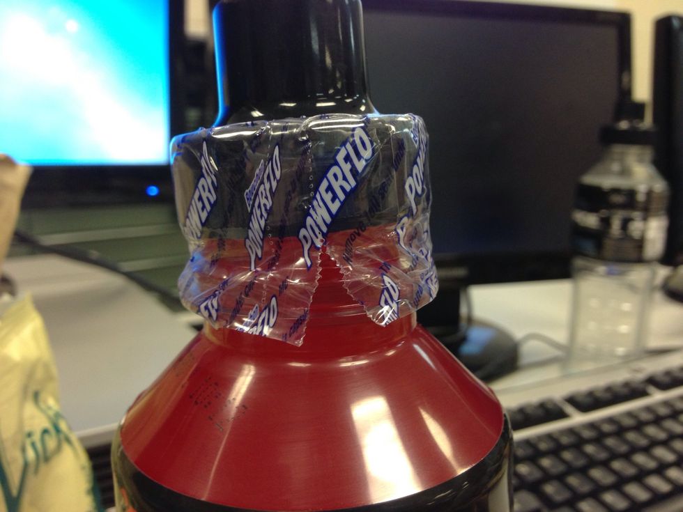 So you start by simply twisting off the top. When you so this the seal will come off with it. Just grab the while top of the bottle.