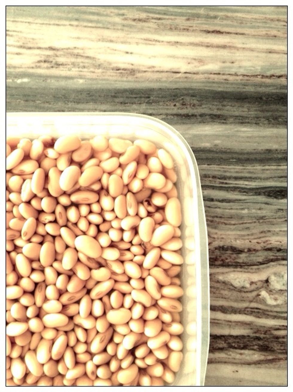Soak 125gr of organic non-GMO soya beans in 2cups of distilled water for about 6hours in a transparent air-tight container