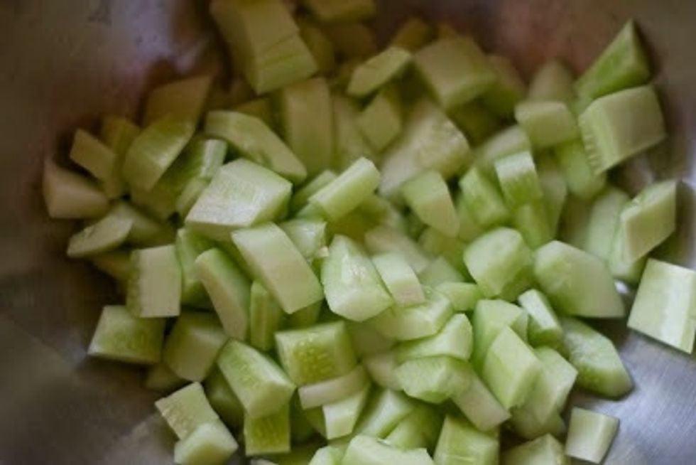 Soak 2 Tbs of mung dal in 1 cup of water for 1 hour. Meanwhile peel and chop 1 lb of cucumbers. I like to use kirbys, the smaller pickling cucumbers because of their firm texture and great flavor.
