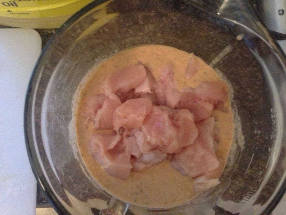 Soak all the chunks of chicken into the flour mixture. Cover each piece completely, nobody likes bland chicken!