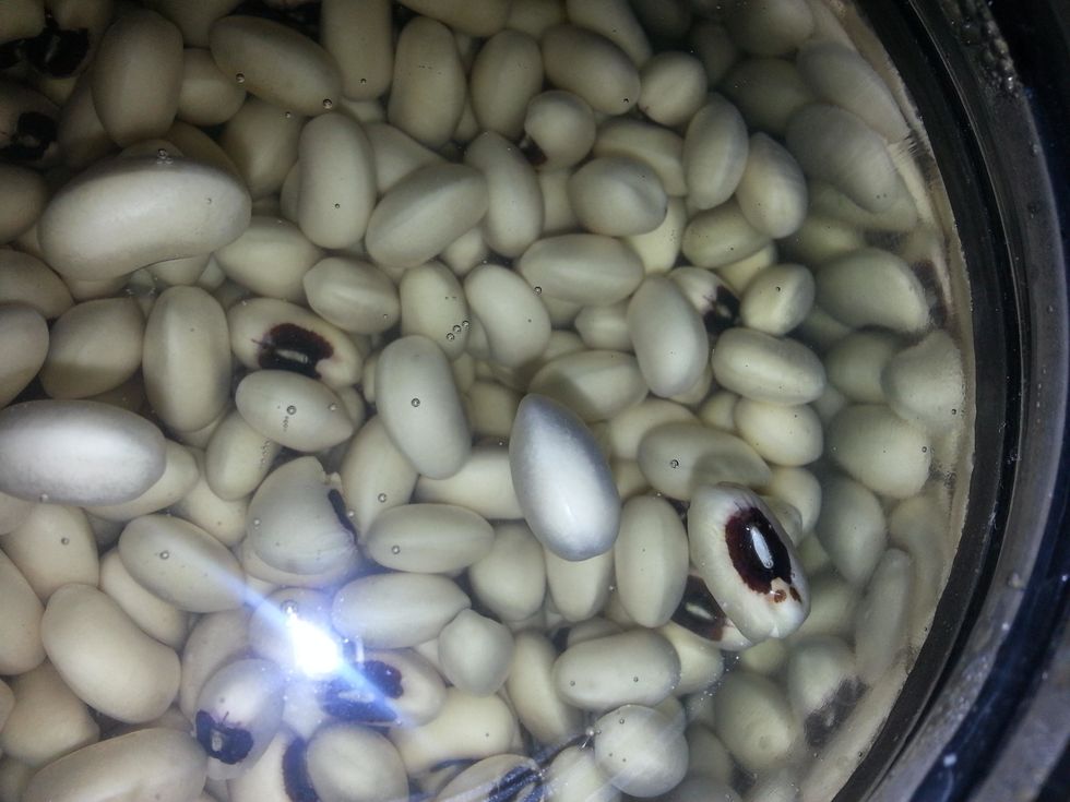 Soak Black Eye Peas in water for 3-4 hours. Cook in pressure cooker till its cooked through but not mush.