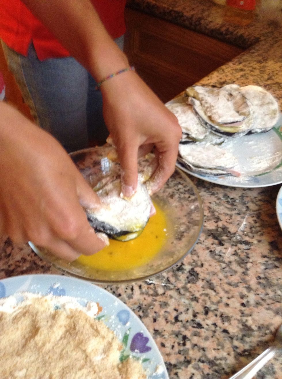 Soak both sides of your eggplants into the whisked eggs