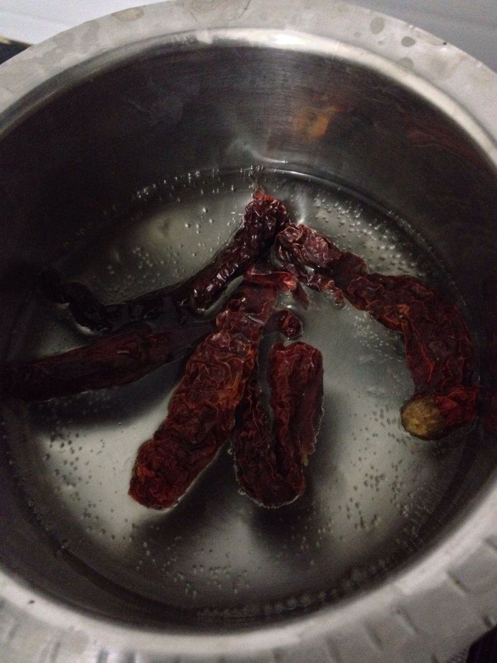 Soak chillies in hot water for 10 min
