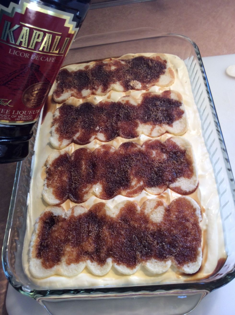 Soak generously with coffee liqueur.