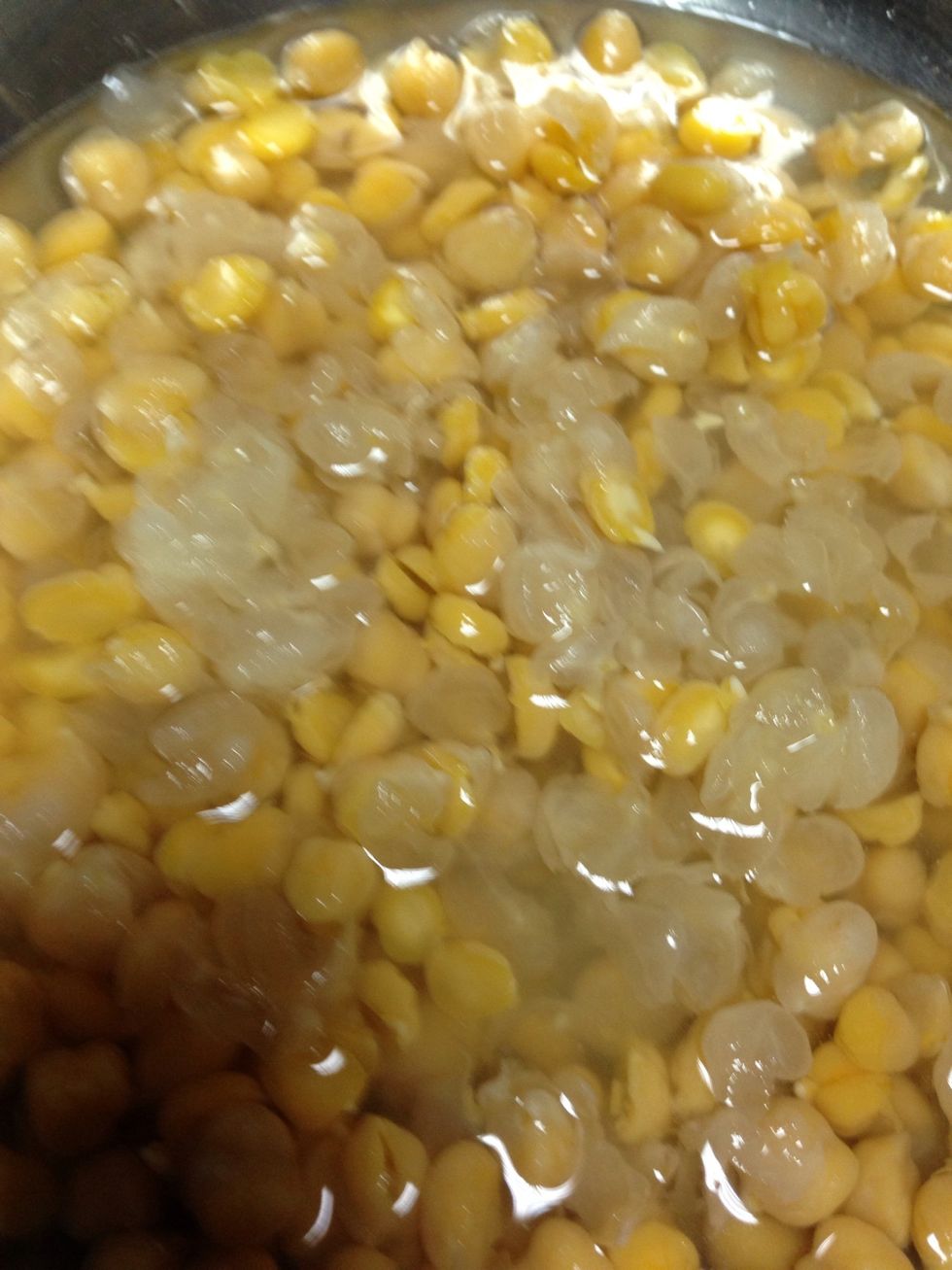 Soak in cold water slipping between your hands so skin would float