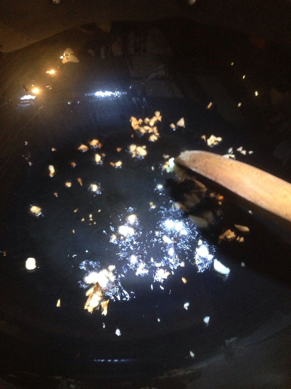 Soak porcini mushrooms with hot water for 10-15mins. Dispose water. Rinse shrooms with warm water for 3-4 times until there's no soil residue. Chop the garlic. Heat pan with olive oil & pan fry garlic