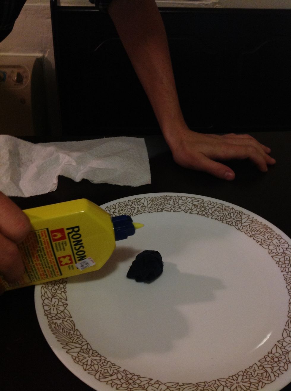 Soak the ball in lighter fluid.