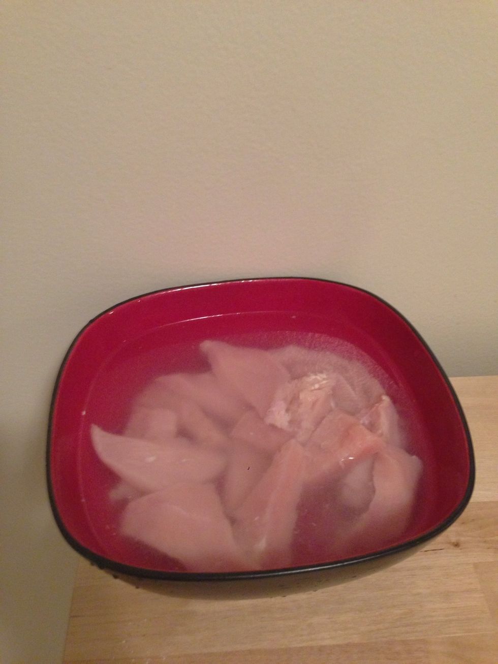 Soak the chicken in water. This is what I will be using for the bran flake mixture to stay. You can also use eggs or milk, but water doesn't add additional calories or flavor.