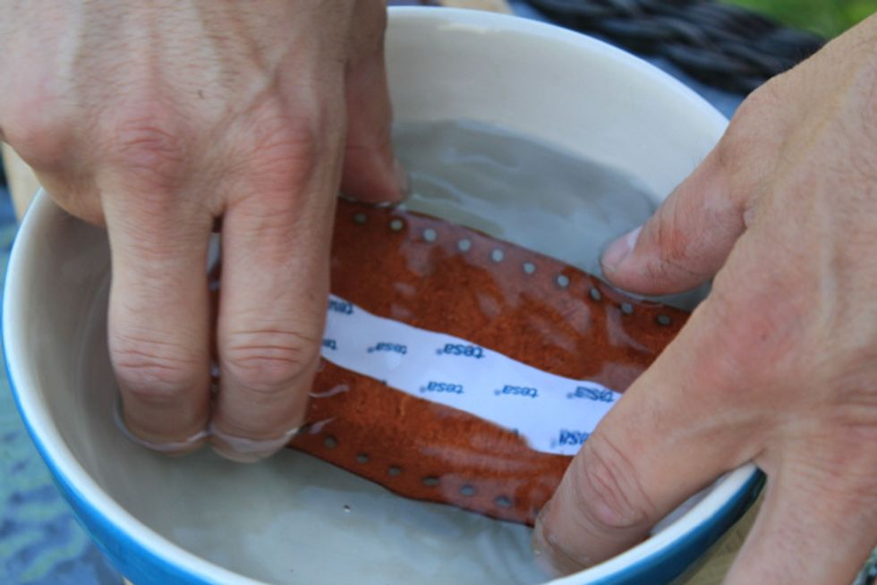 Soak the grip in warm water for 2-3 minutes, remove and dry off. Peel the backing off the tape and apply the grip to the bar as in the test fit. Smooth the grip around and along the bar for a good fit