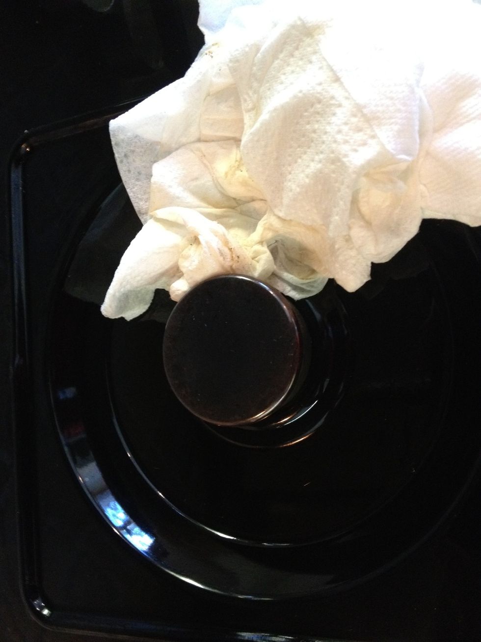 Soak up the solution with a dry paper towel or rag