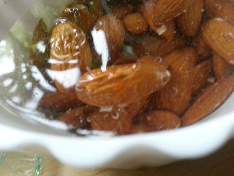 Soaked almonds. Put the almonds into blender with juice.