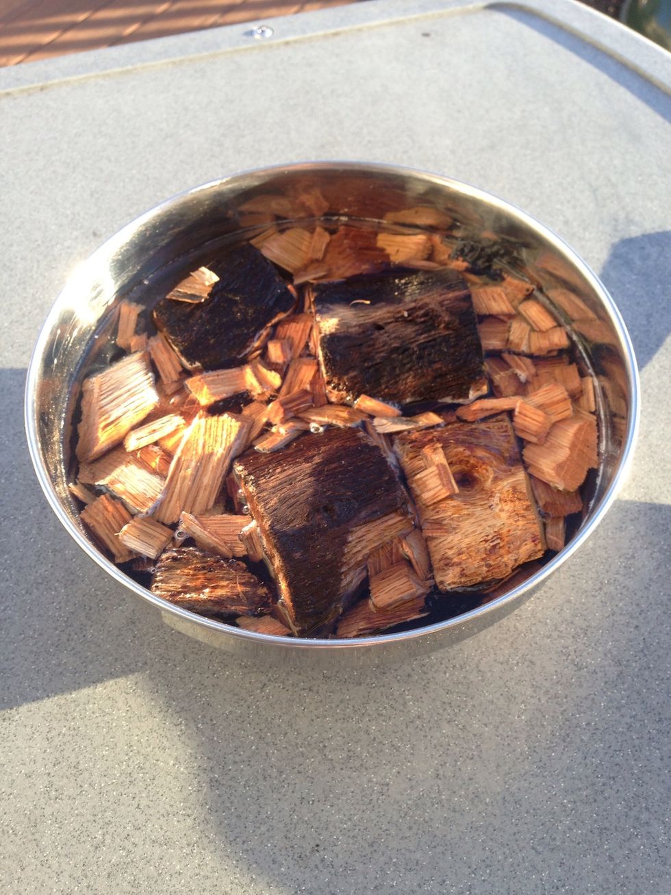 Soaking the oak chunks & oak whiskey barrel chips. Experiment with different types of wood - oak is economical & great all around, but I also like hickory, mesquite, pecan, cherry, cedar & applewood.