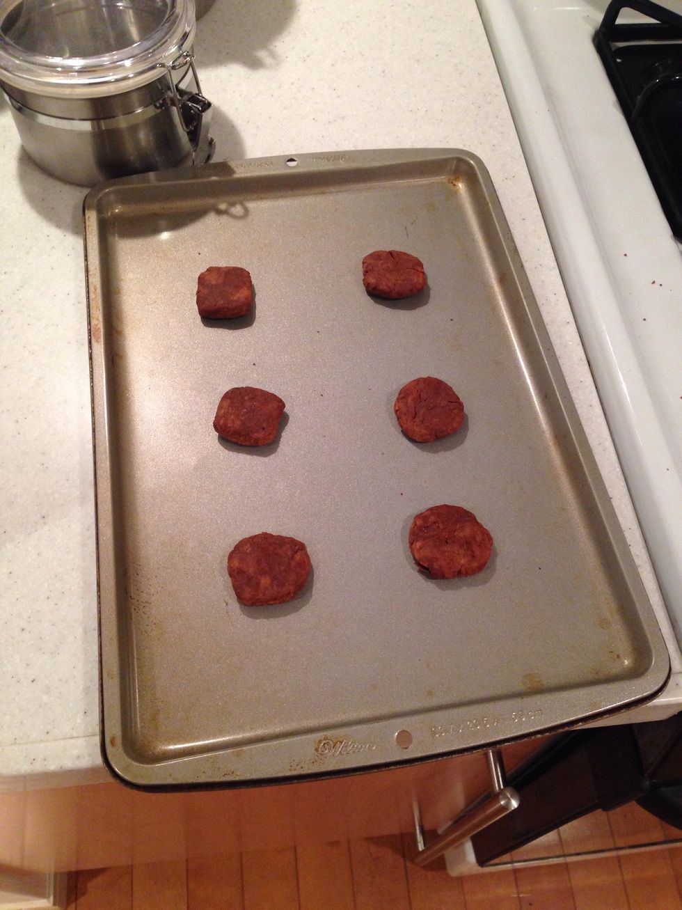 Soften & flatten the squares with your hands and place them on a cookie pan.