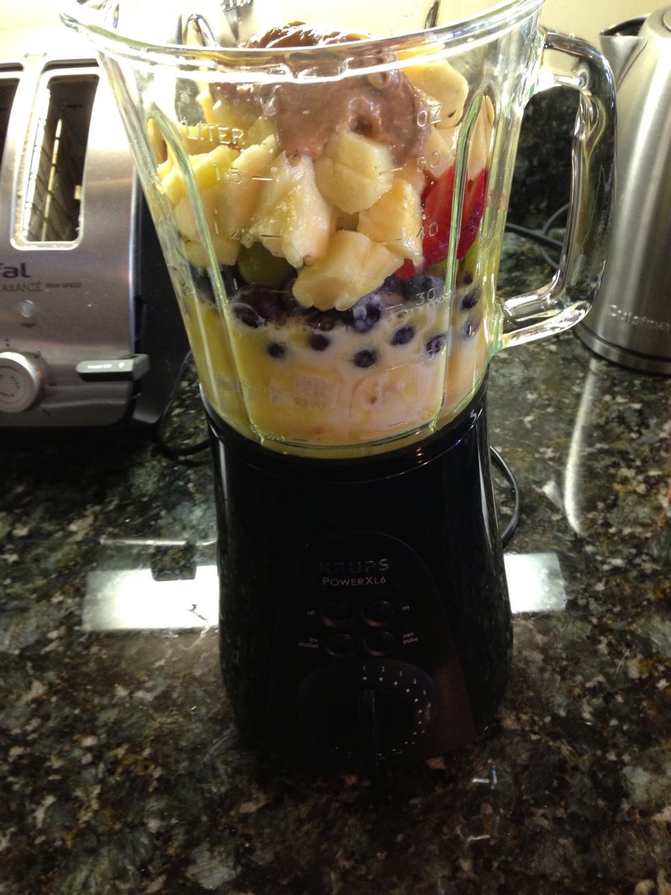 Solids in first- liquids over the top. Give a few pulses before blending, and let it rip along until creamed.