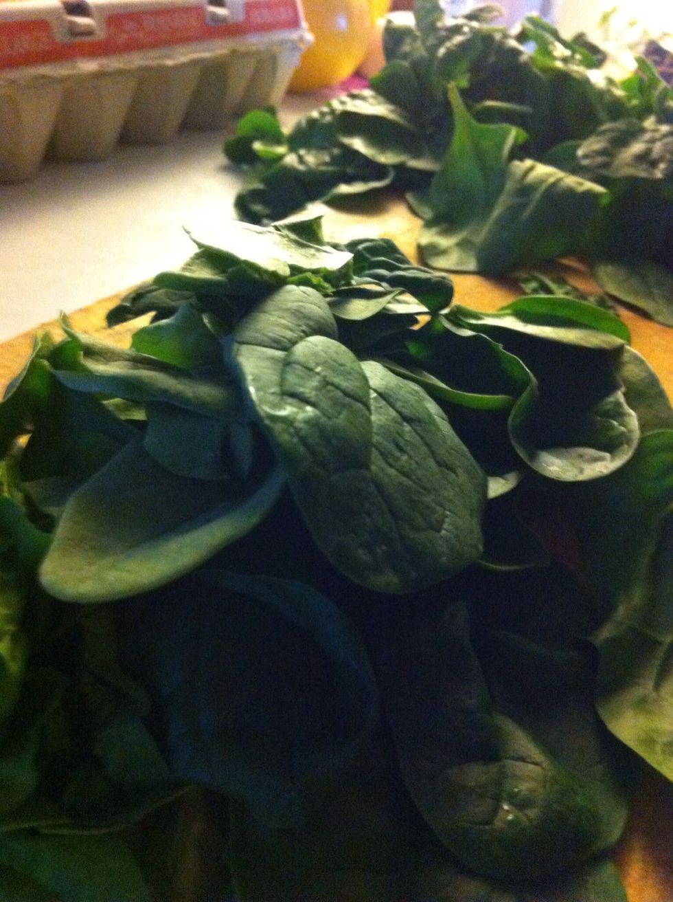 Some baby spinach. I deveined them cuz I do that. Like obsessively. Add the spinach and the rest of the chopped green chilies and then simmer for a while. Like 20 minutes.