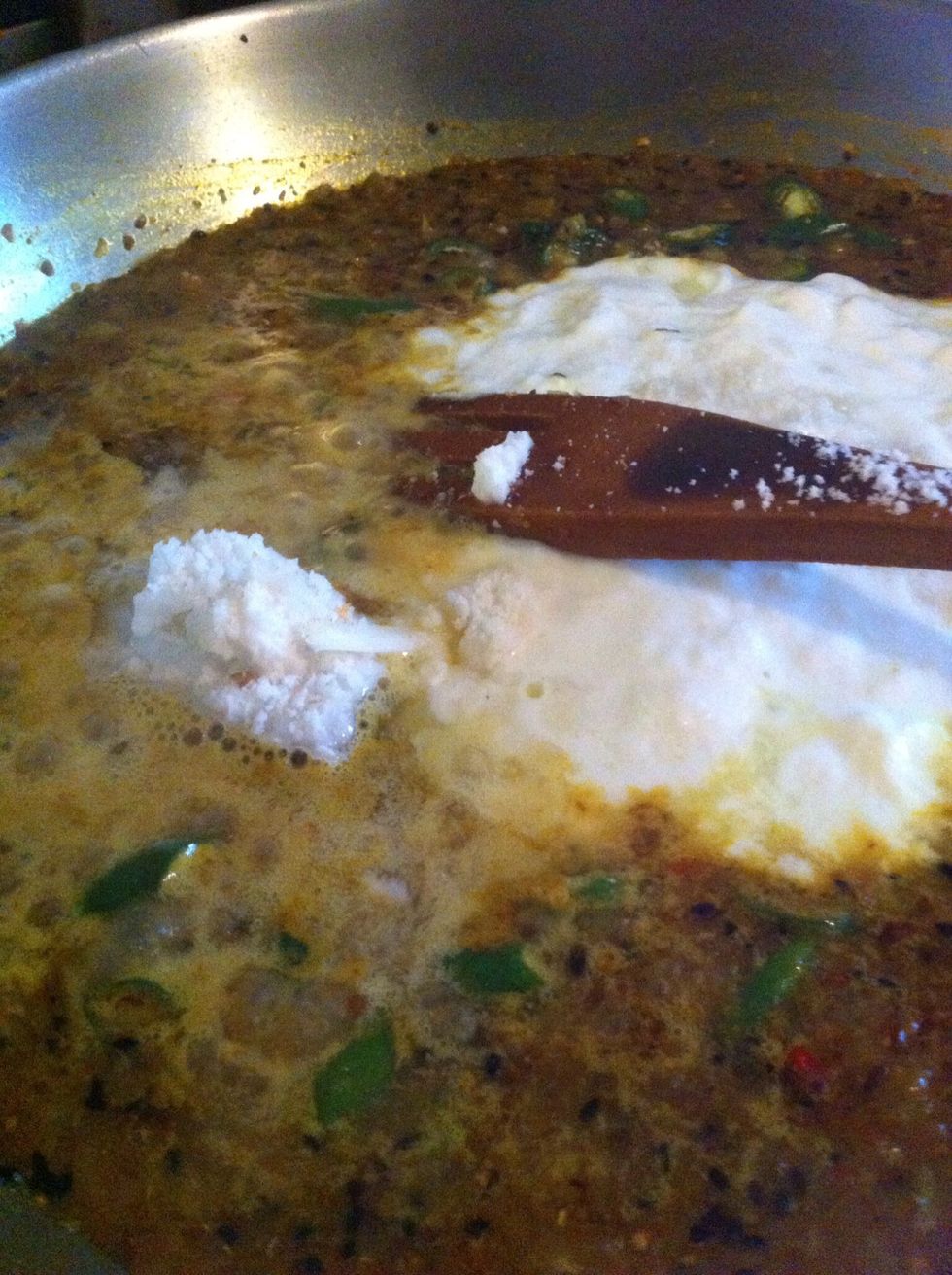 Some creamed coconut and a sprinkle of sea salt too. Melt it down. I added the chopped green chilies to this too. This was the moment.