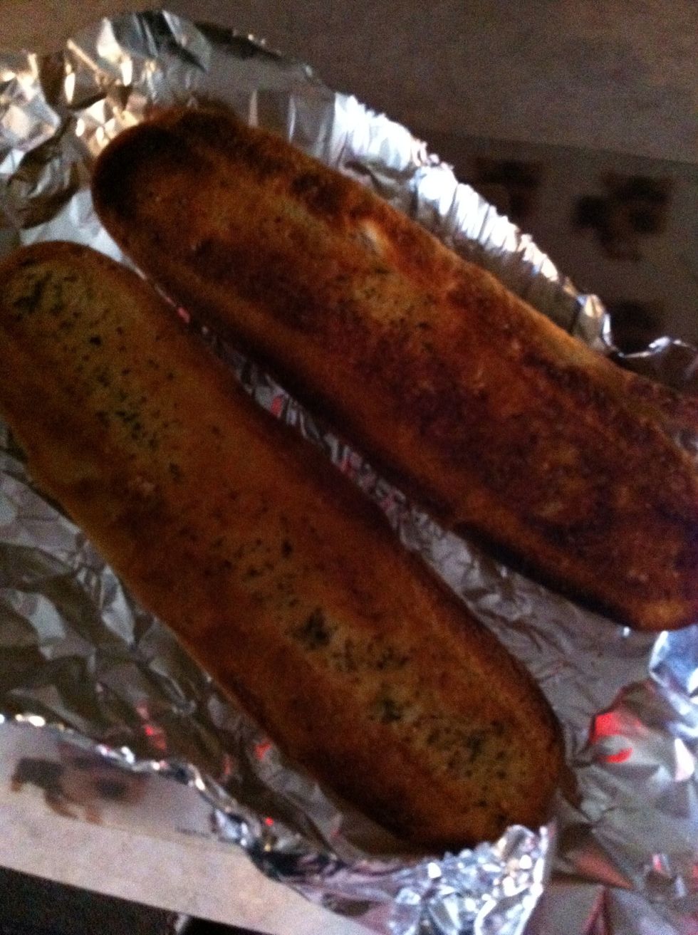 Some garlic bread on the side.