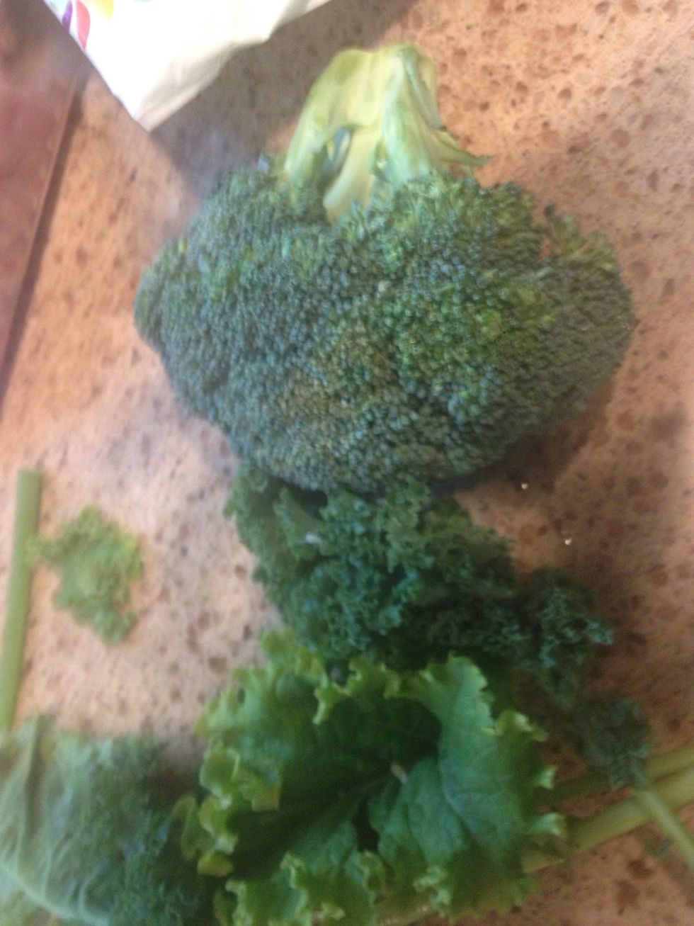 Some kale that had seen better days....as well as broccoli that was starting to take on that "been too long in the fridge brownish hue." Chopped them up and added them too.