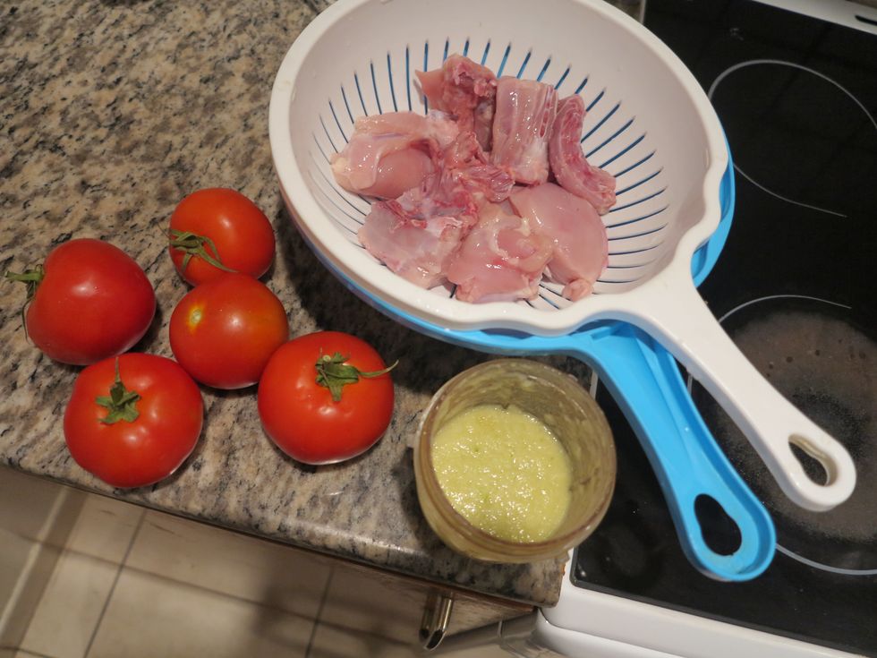 Some of the ingredients. Make sure the paste is prepared before starting the cooking process. Wash the chicken pieces and set to drain.