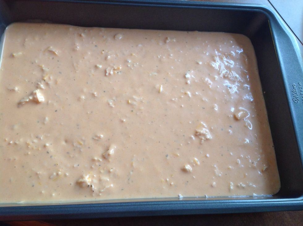 Some people put cream cheese in the bottom of the pan, I don't but you can. Just make sure it is even. Add the buffalo chicken sauce.