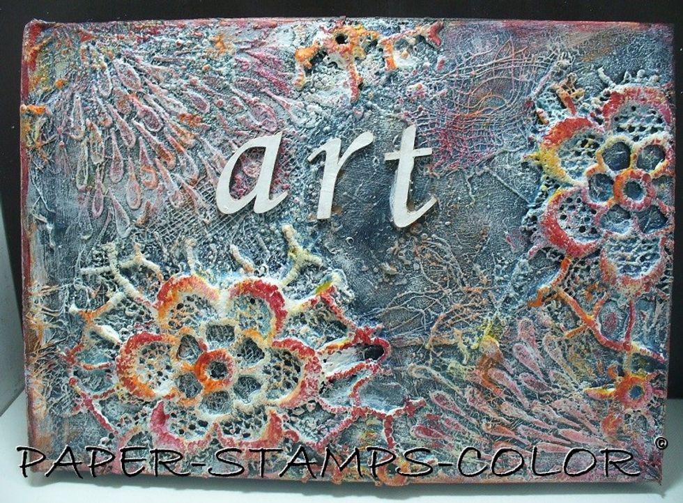 Some photo's of the front cover, after adding some ART letters, painted with white acrylic paint.