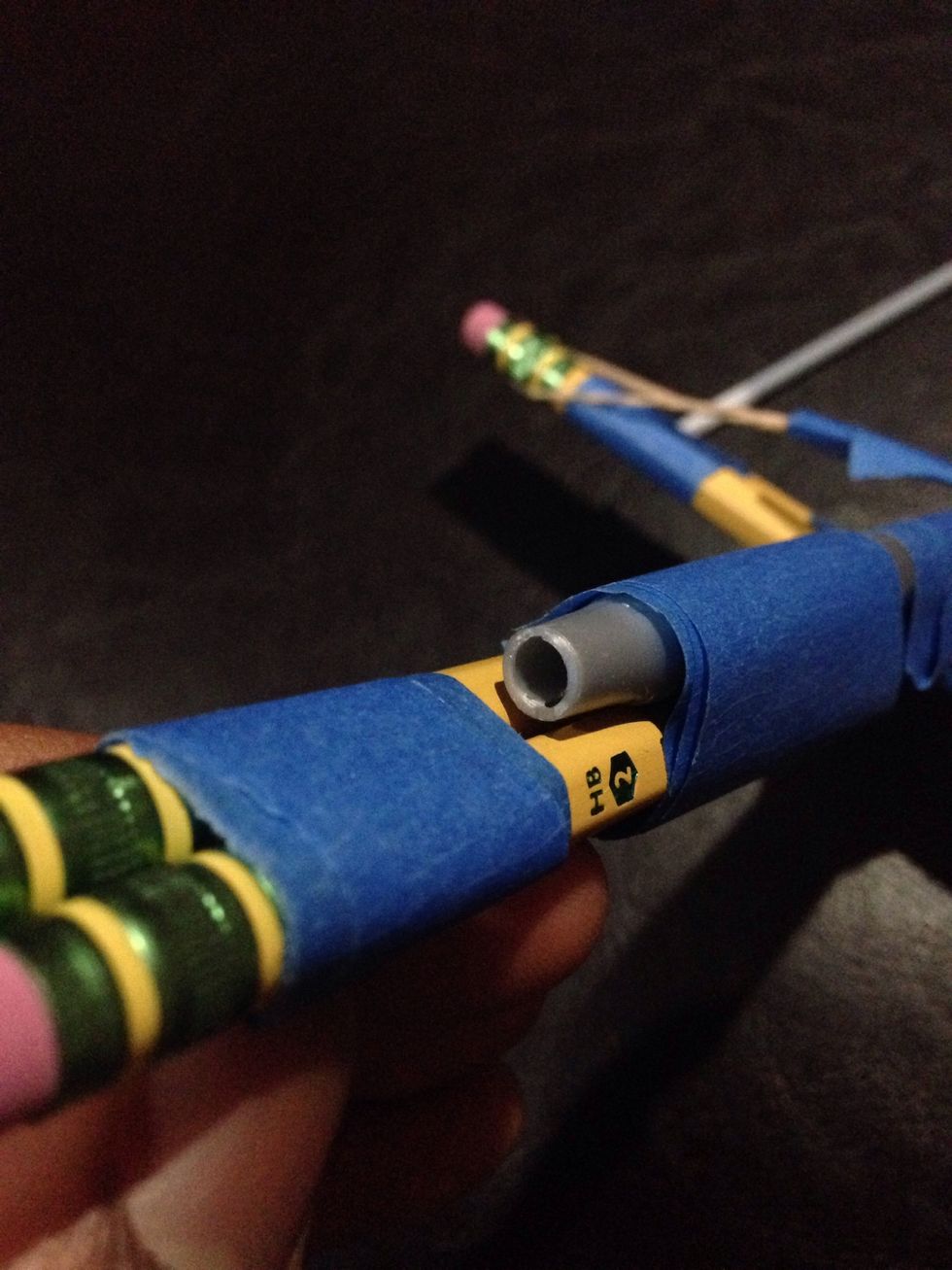 Some projectiles can be loaded from the front of the crossbow, it may be faster. Experiment  with different types of projectiles.