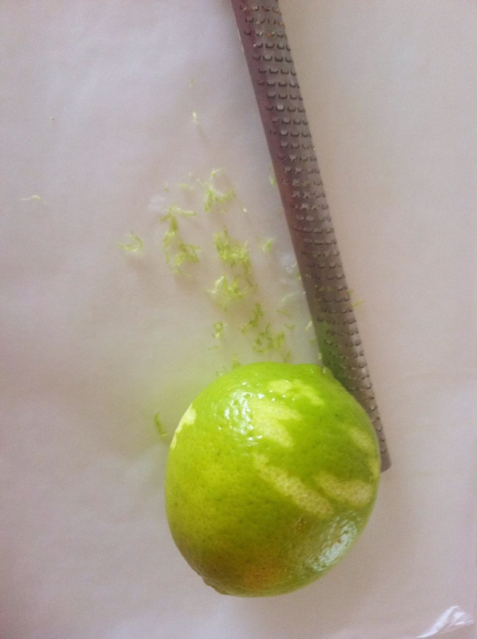 Some rasps are flat but I use a round one. Gently run the rasp against the lime being careful not to pick up any of the white pith.