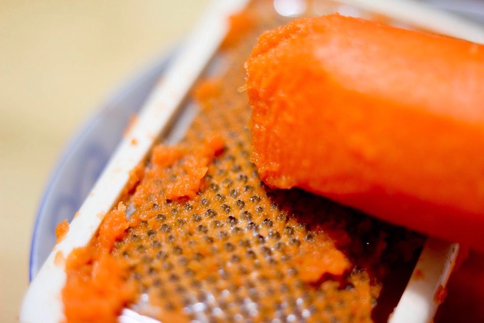 Some recipes include ground carrots or Daikon Radish. It adds an extra layer of texture and subtle natural sweetness. Above is ground carrots and the tool you use to make the fine silky texture...