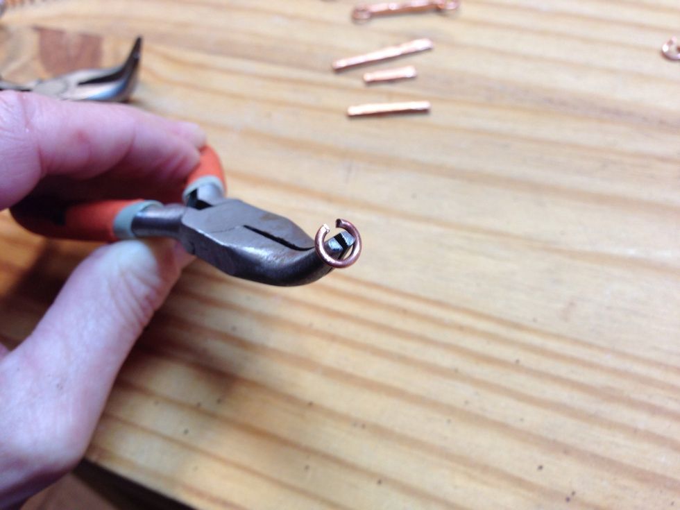 Sometimes the tip of your pliers will splay the jump ring evenly,