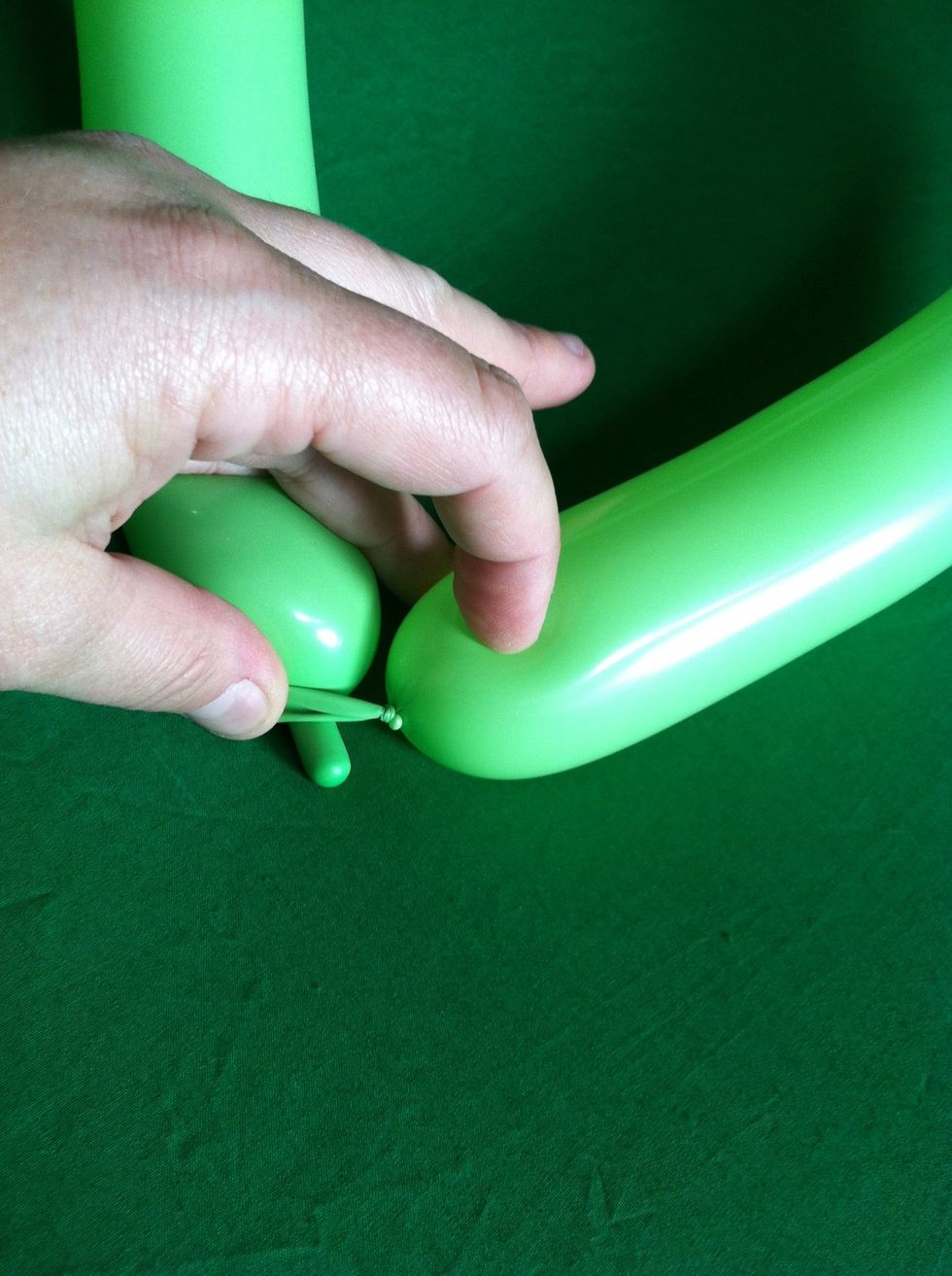 Sometimes you will need to tie balloons in a circle.  Just tie a double knot connecting one end of the balloon to the other